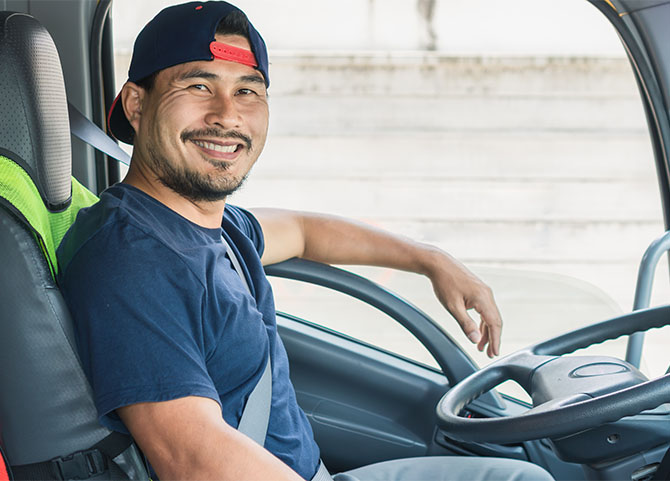 Happy smiling truck driver